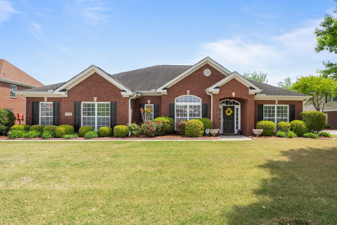 3107 Mossy Rock Rd: Timeless Full-Brick Beauty in the Heart of Hampton Cove