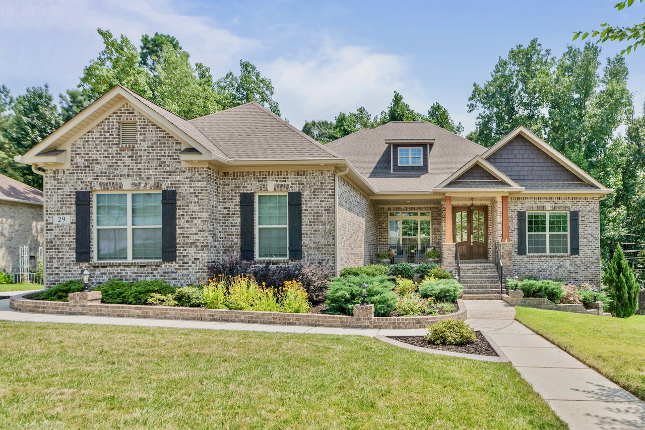 Front exterior of 29 Natures Ridge Way, a luxury home for sale in The Preserve at Inspiration community in Huntsville, Alabama.