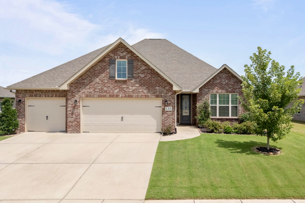 Full-brick 4-bedroom home with 3-car garage for sale at 135 Slade Thomas Drive in Meridianville, Alabama